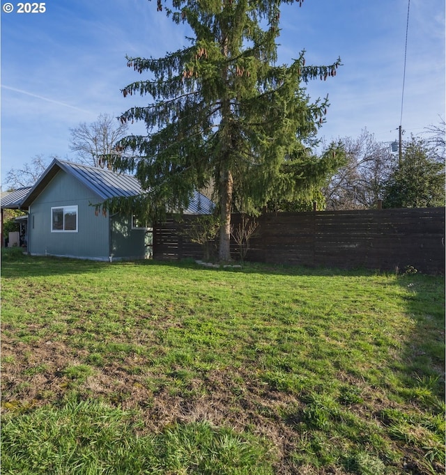 view of yard featuring fence