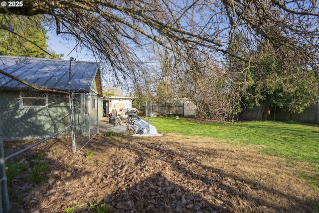 view of yard with a patio area and fence