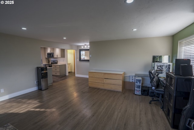 office space featuring recessed lighting, baseboards, and dark wood-style flooring