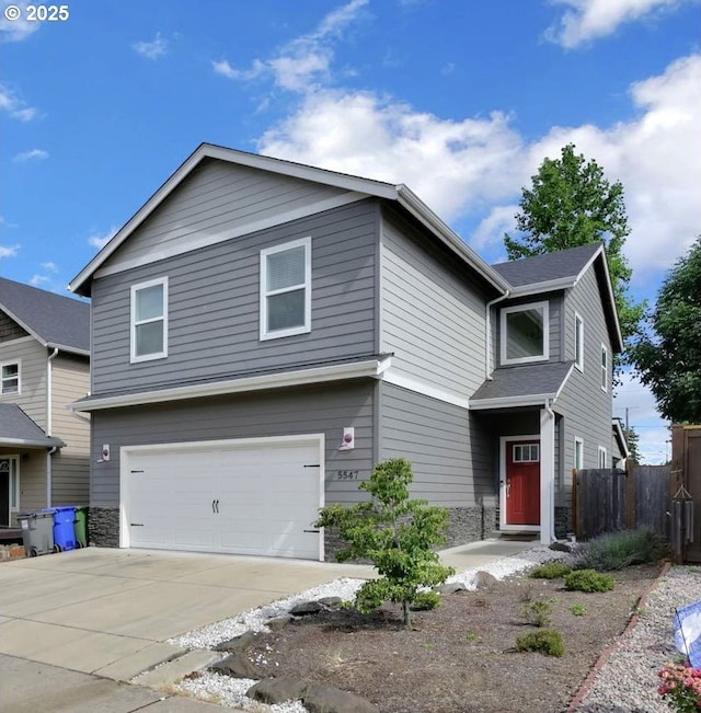 view of front of property with a garage