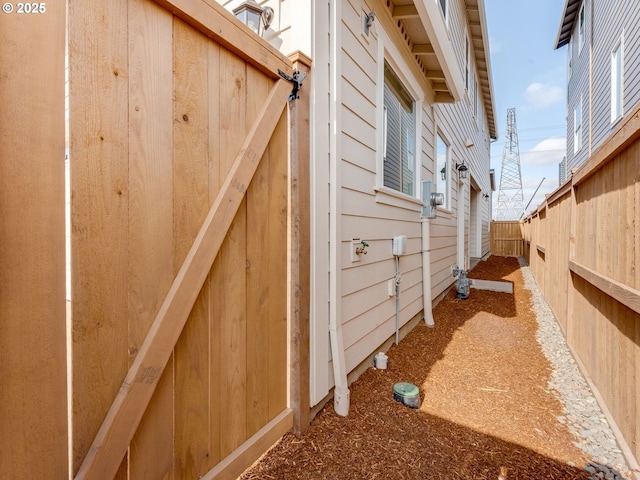 view of property exterior with fence