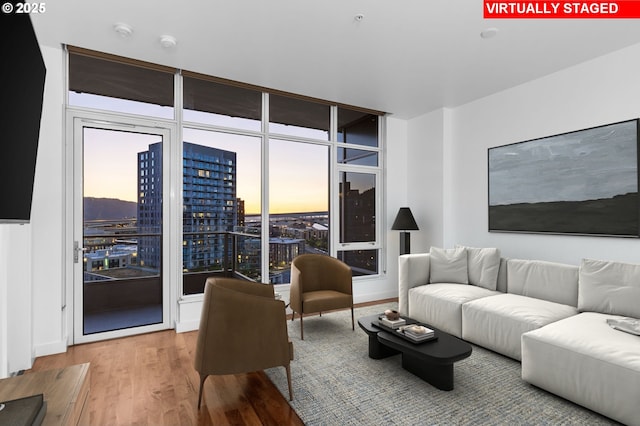 949 NW Overton St Unit 1304, Portland, OR 97209 - living area featuring wood finished floors and a view of city