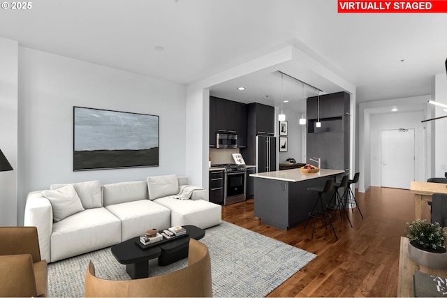 949 NW Overton St Unit 1304, Portland, OR 97209 - living area featuring dark wood-style floors and recessed lighting