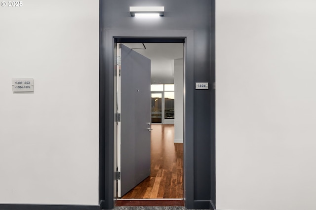 949 NW Overton St Unit 1304, Portland, OR 97209 - corridor featuring wood finished floors