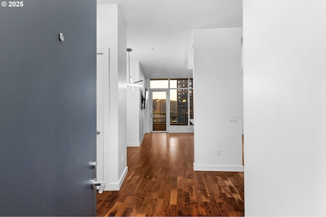 949 NW Overton St Unit 1304, Portland, OR 97209 - hall featuring wood finished floors and baseboards