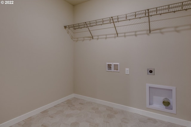 washroom featuring washer hookup, baseboards, laundry area, and electric dryer hookup