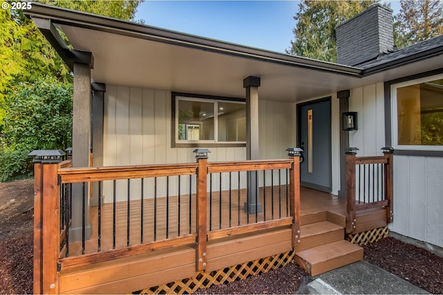 wooden deck featuring covered porch