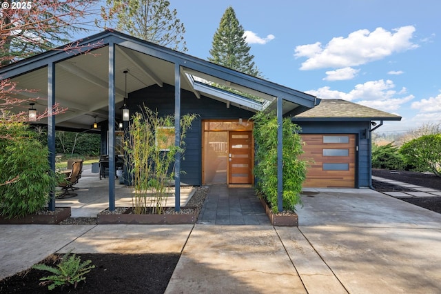 view of front of home with a garage