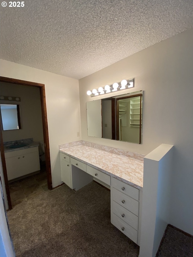 845 Waite St, Eugene, OR 97402 - bathroom featuring a textured ceiling and vanity
