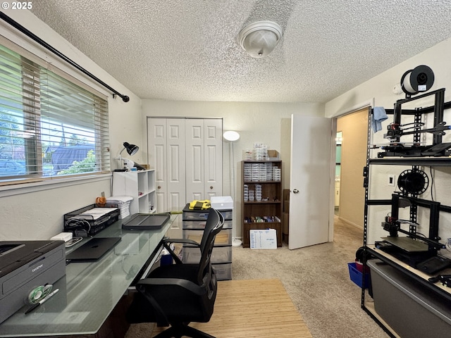office space with a textured ceiling