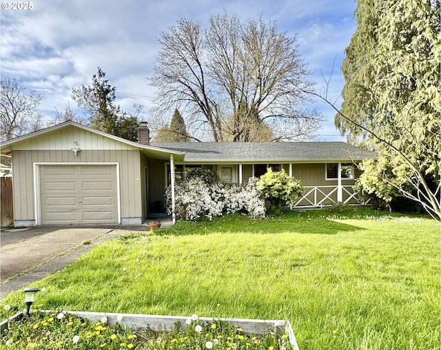 ranch-style house with a chimney, a garage, a front yard, and driveway
