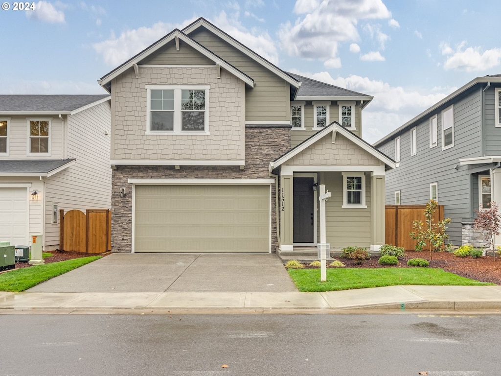 craftsman-style house featuring a garage