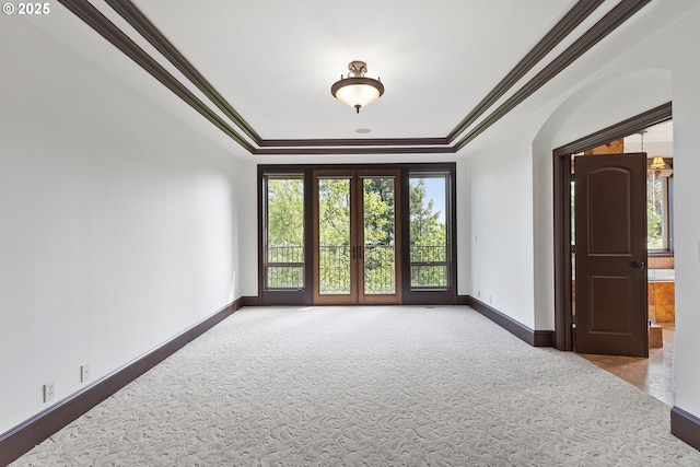 632 W T St, Washougal, WA 98671 - carpeted empty room with baseboards, a raised ceiling, and ornamental molding