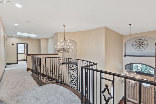 632 W T St, Washougal, WA 98671 - corridor with an upstairs landing, a chandelier, carpet flooring, baseboards, and recessed lighting