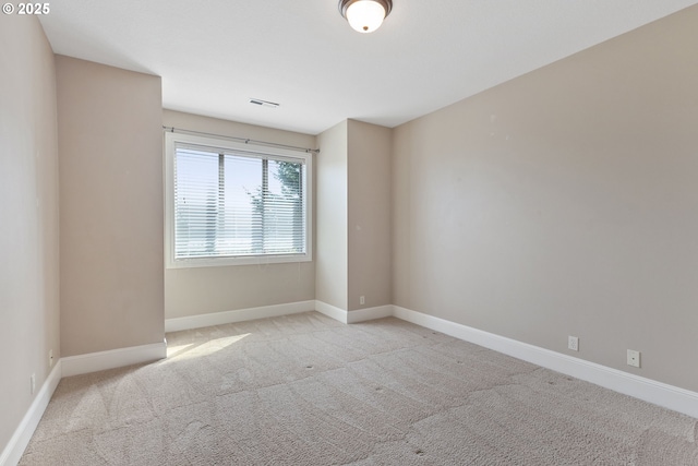 632 W T St, Washougal, WA 98671 - spare room with light carpet and baseboards