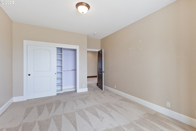 632 W T St, Washougal, WA 98671 - unfurnished bedroom with light carpet, a closet, and baseboards