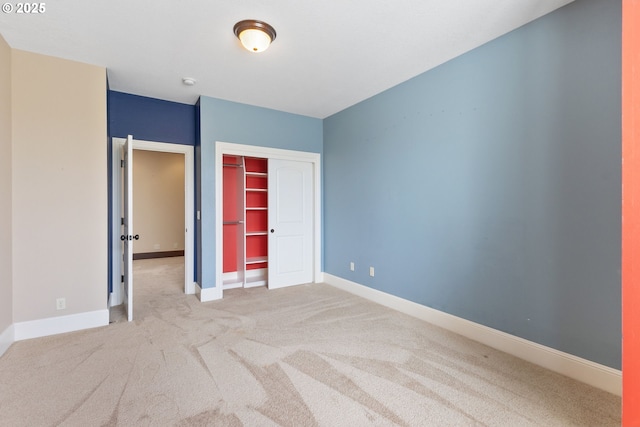 632 W T St, Washougal, WA 98671 - unfurnished bedroom featuring carpet, a closet, and baseboards