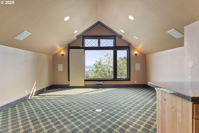 632 W T St, Washougal, WA 98671 - additional living space with carpet flooring, vaulted ceiling, a textured ceiling, baseboards, and recessed lighting