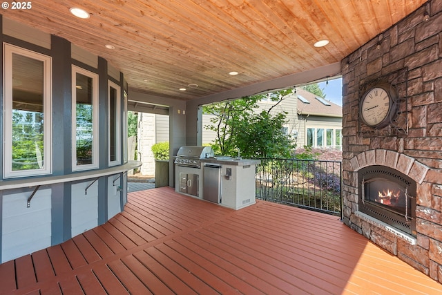 632 W T St, Washougal, WA 98671 - deck with an outdoor stone fireplace and a sink