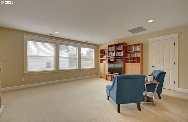 3313 NW Sierra Dr, Camas, WA 98607 - sitting room featuring light carpet, baseboards, and recessed lighting