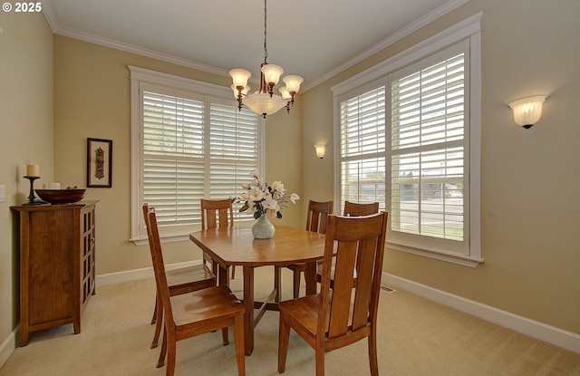 3313 NW Sierra Dr, Camas, WA 98607 - dining space featuring ornamental molding, a chandelier, healthy amount of natural light, light carpet, and baseboards