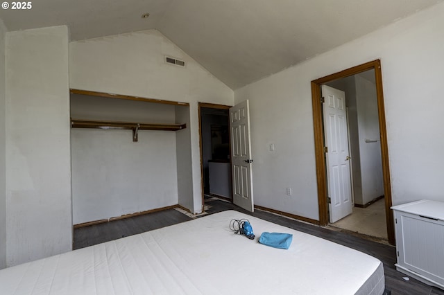 912 SE 193rd Ave, Portland, OR 97233 - bedroom with a closet, lofted ceiling, and dark wood-style flooring