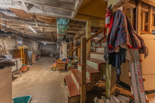 unfinished basement featuring stairway