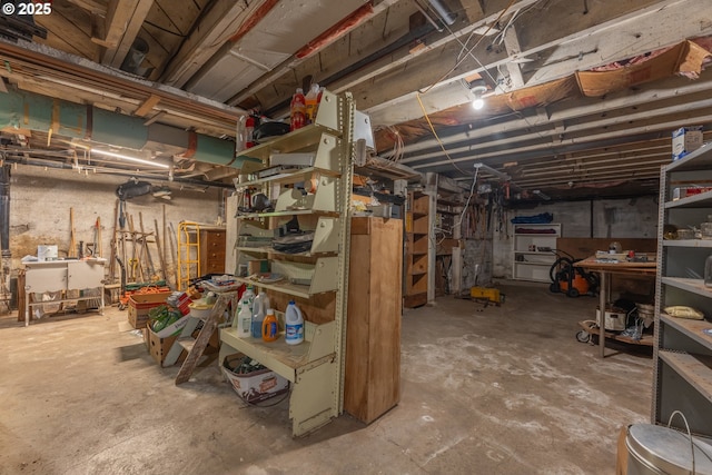 unfinished below grade area featuring a workshop area