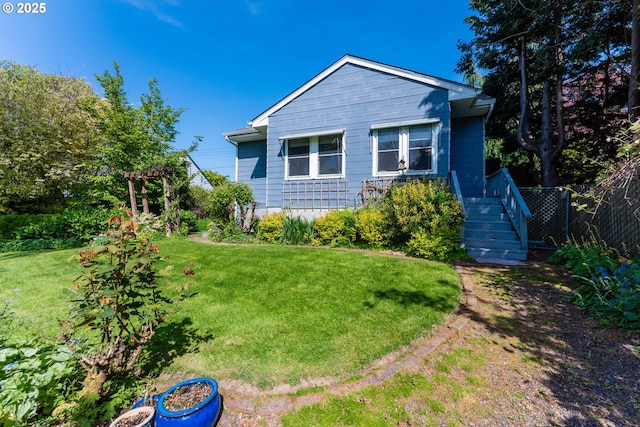 exterior space featuring a front yard