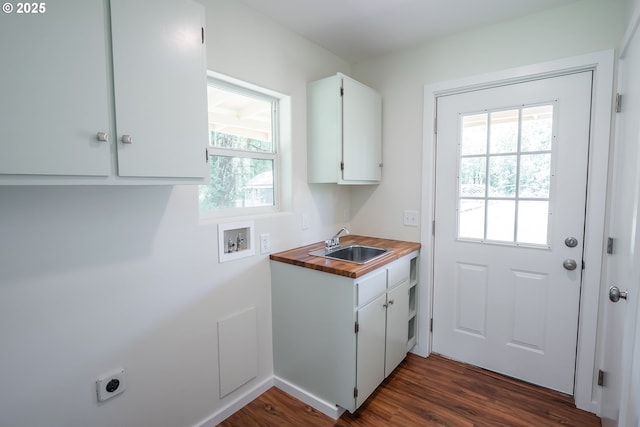 28788 Gimpl Hill Rd, Eugene, OR 97402 - laundry room featuring hookup for a washing machine, hookup for an electric dryer, cabinet space, and dark wood-style flooring