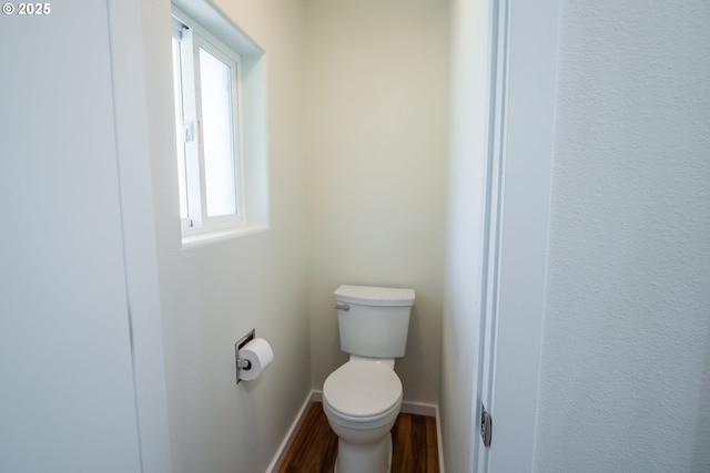 28788 Gimpl Hill Rd, Eugene, OR 97402 - bathroom with wood finished floors, toilet, and baseboards