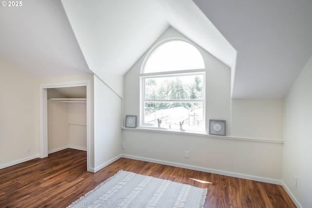 28788 Gimpl Hill Rd, Eugene, OR 97402 - unfurnished bedroom with vaulted ceiling, wood finished floors, a closet, and baseboards
