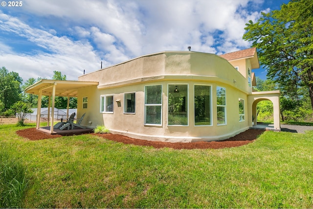 28788 Gimpl Hill Rd, Eugene, OR 97402 - rear view of house with a yard and stucco siding