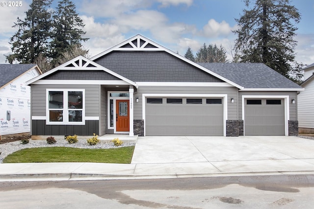 craftsman inspired home with a garage