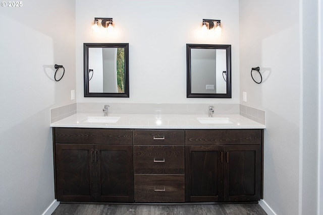 bathroom featuring vanity and wood-type flooring