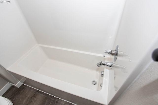 bathroom featuring hardwood / wood-style flooring