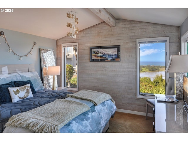 bedroom featuring carpet floors, baseboards, multiple windows, and vaulted ceiling with beams