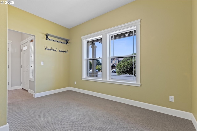 7115 NE Benton Pl, Newport, OR 97365 - carpeted empty room featuring baseboards