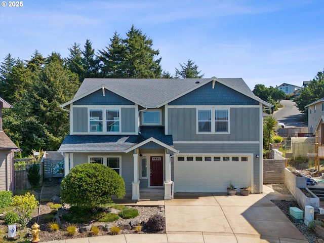 7115 NE Benton Pl, Newport, OR 97365 - craftsman house with an attached garage, concrete driveway, and a shingled roof