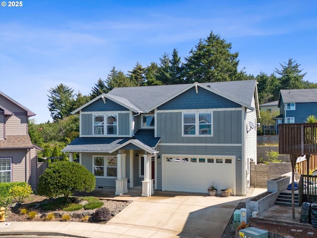 7115 NE Benton Pl, Newport, OR 97365 - craftsman house featuring driveway, a garage, board and batten siding, and a shingled roof