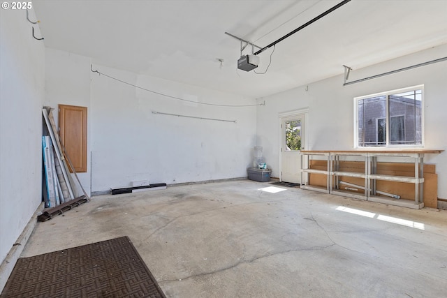 7115 NE Benton Pl, Newport, OR 97365 - garage featuring a garage door opener