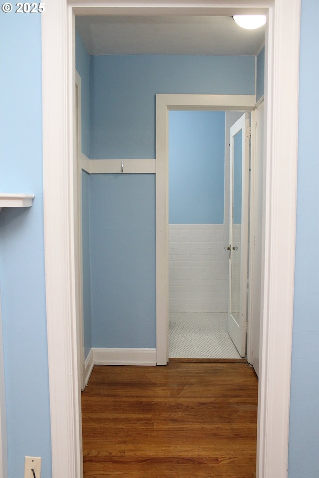 hallway featuring wood finished floors