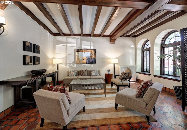 709 SW 16th Ave Unit 105, Portland, OR 97205 - tiled living room featuring beamed ceiling