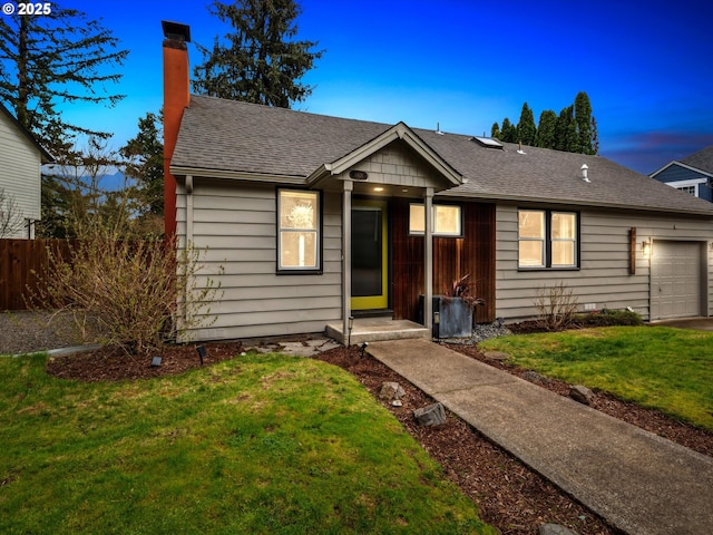 8978 SW Terreton Pl, Portland, OR 97223 - ranch-style home with a chimney, an attached garage, and roof with shingles