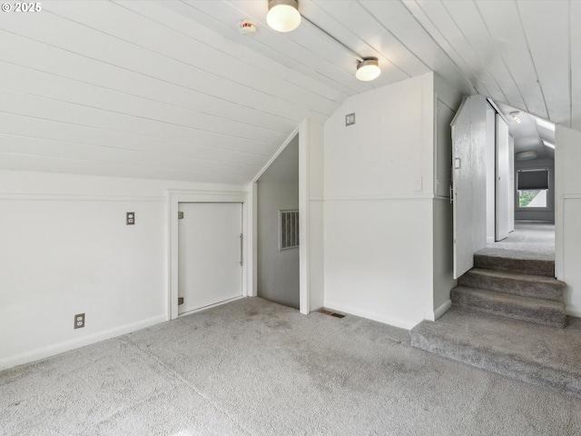 8978 SW Terreton Pl, Portland, OR 97223 - additional living space featuring vaulted ceiling, carpet flooring, and baseboards