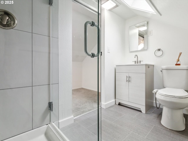 8978 SW Terreton Pl, Portland, OR 97223 - full bath featuring a walk in shower, vanity, a skylight, toilet, and baseboards