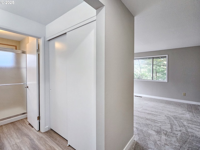 hall featuring light wood-type flooring