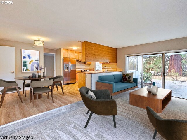 unfurnished room with carpet and a textured ceiling