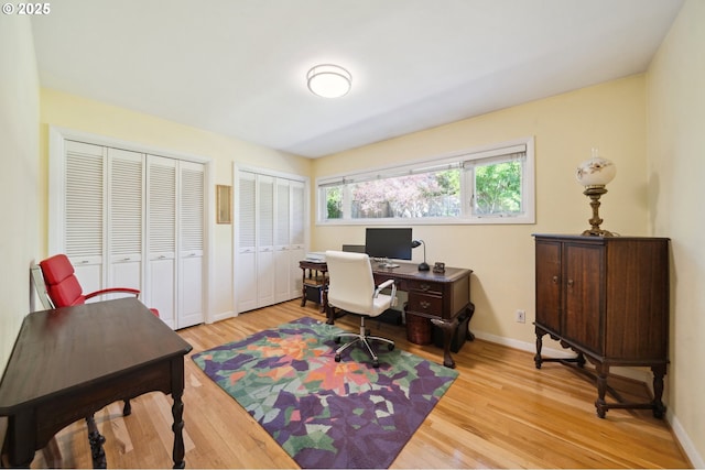 8301 SW 6th Ave, Portland, OR 97219 - home office featuring light wood finished floors and baseboards