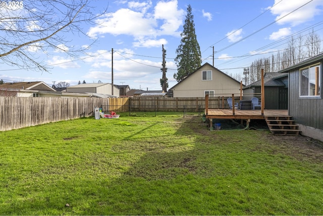 view of yard featuring a wooden deck